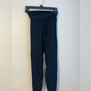 cross top black leggings